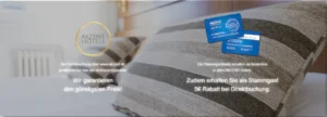 Cozy hotel room with a striped pillow and AKZENT Hotels' loyalty card placed next to it, promoting the trust guarantee and offering a 5€ discount for direct bookings.